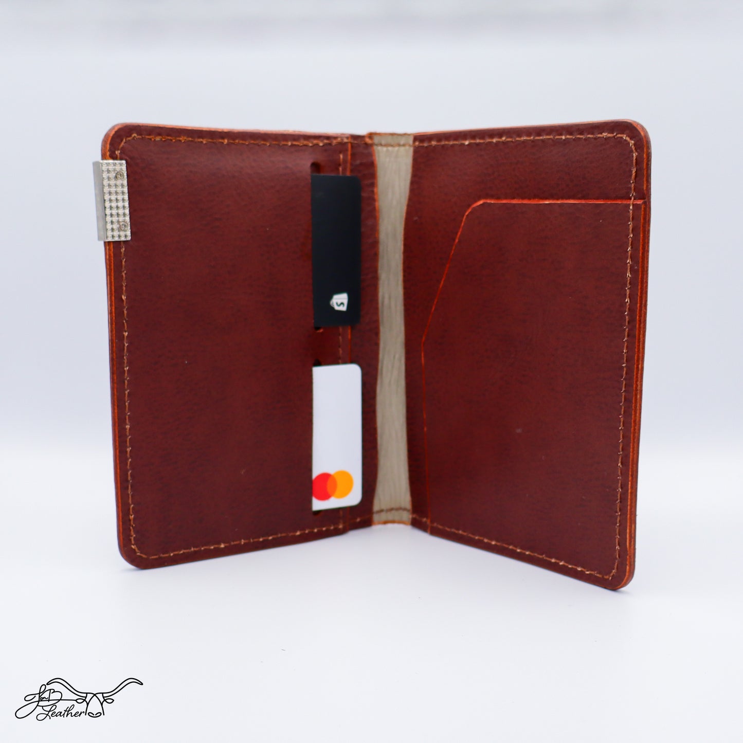 Brown Bilman Passport Wallet open view with cards inside and RFID protection