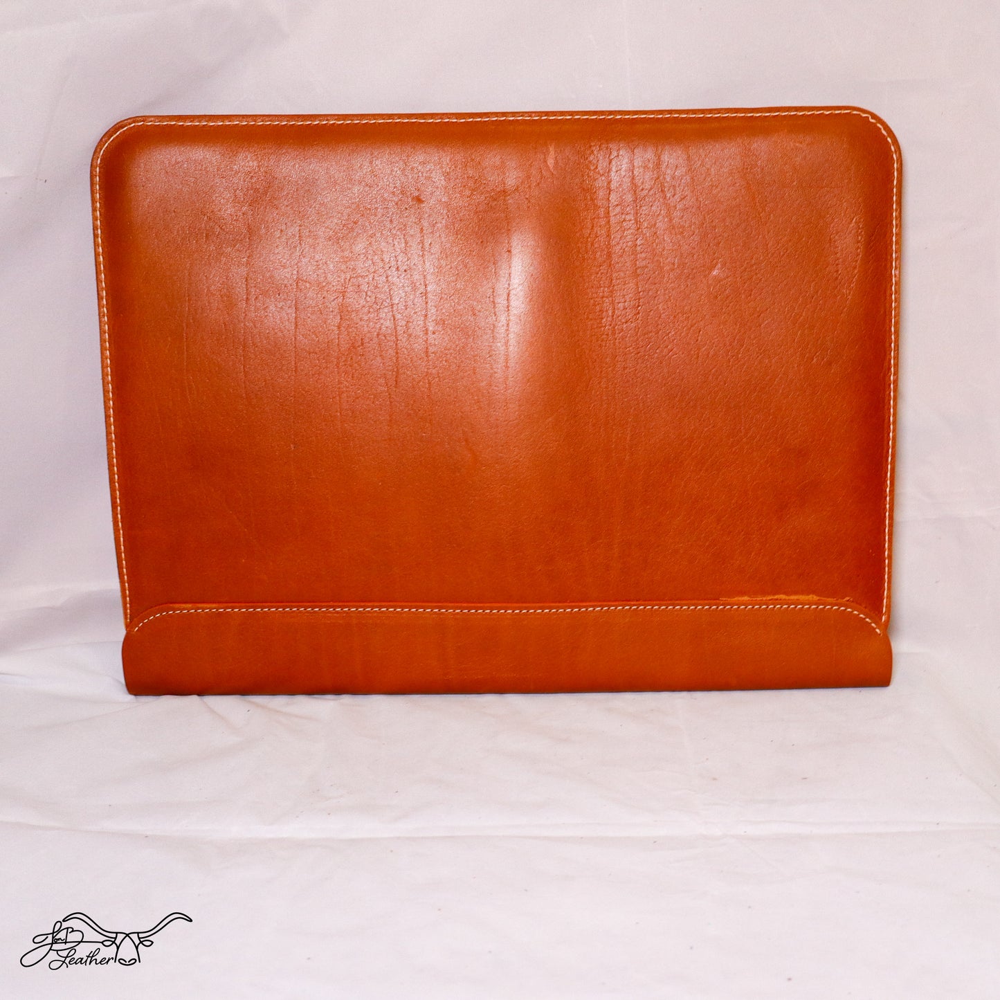 Laptop Sleeve Lined in Suede backside view in cognac leather