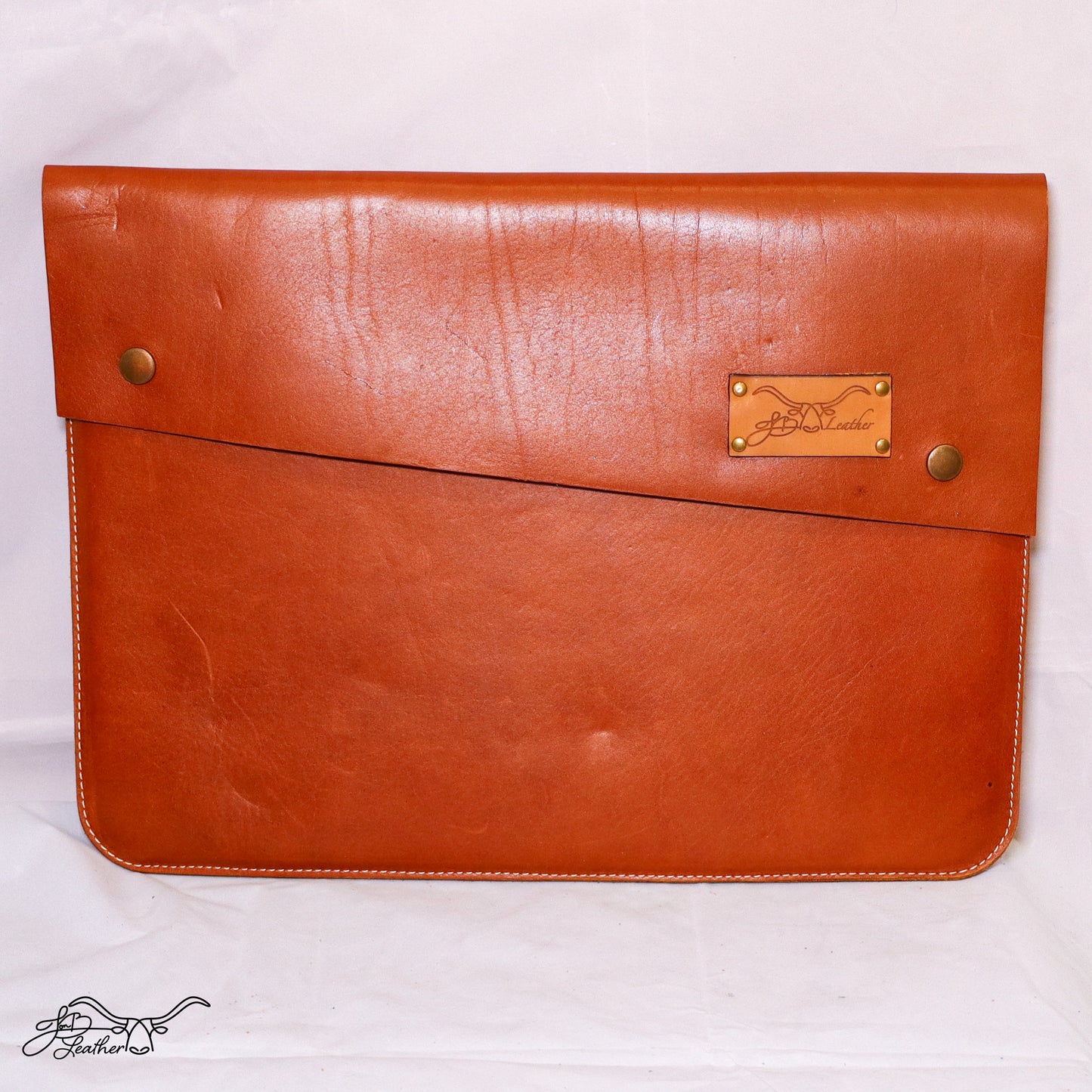 Laptop Sleeve Lined in Suede with double snap closure detail