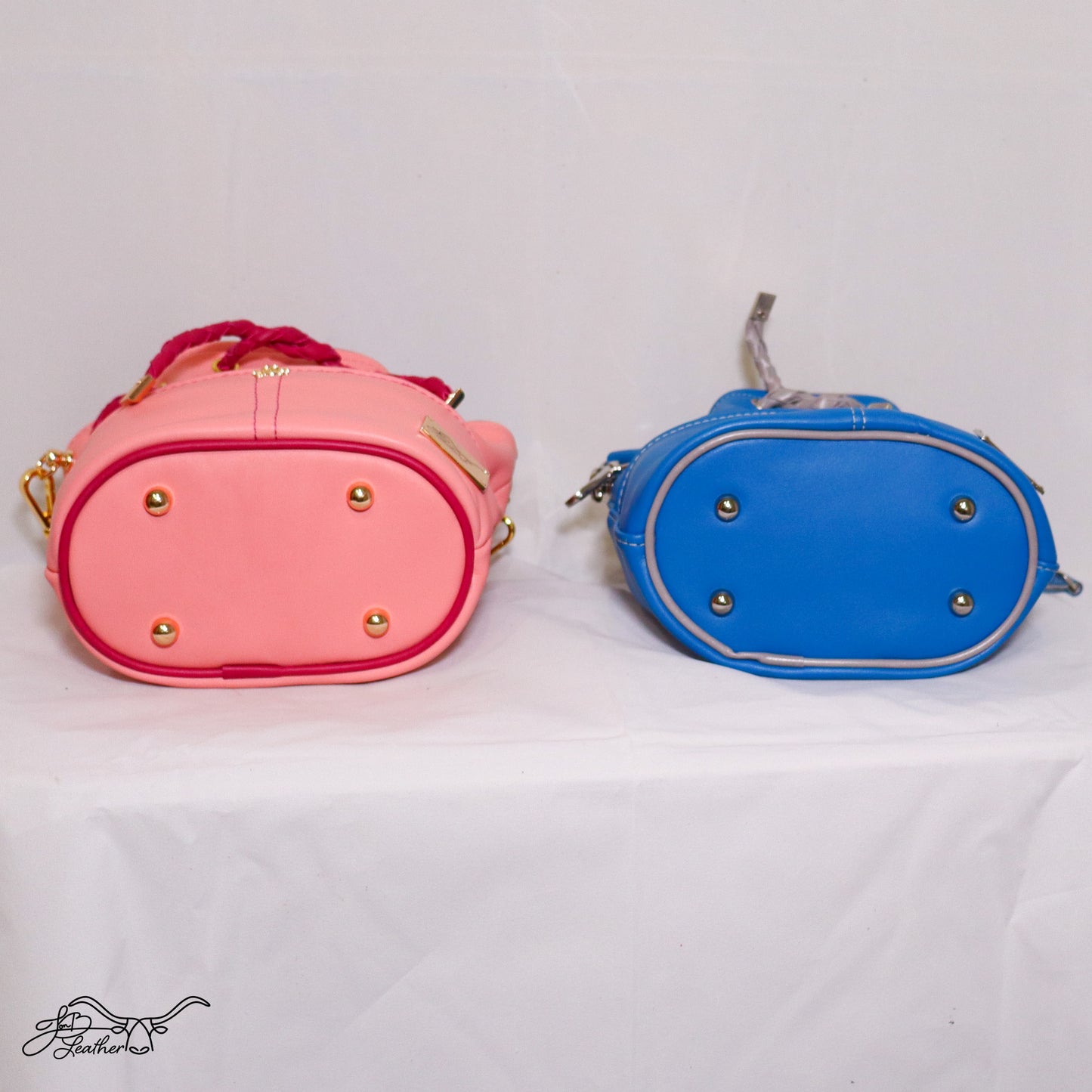 Footed bottom view of handmade leather Mini Drawstring Crossbody bag