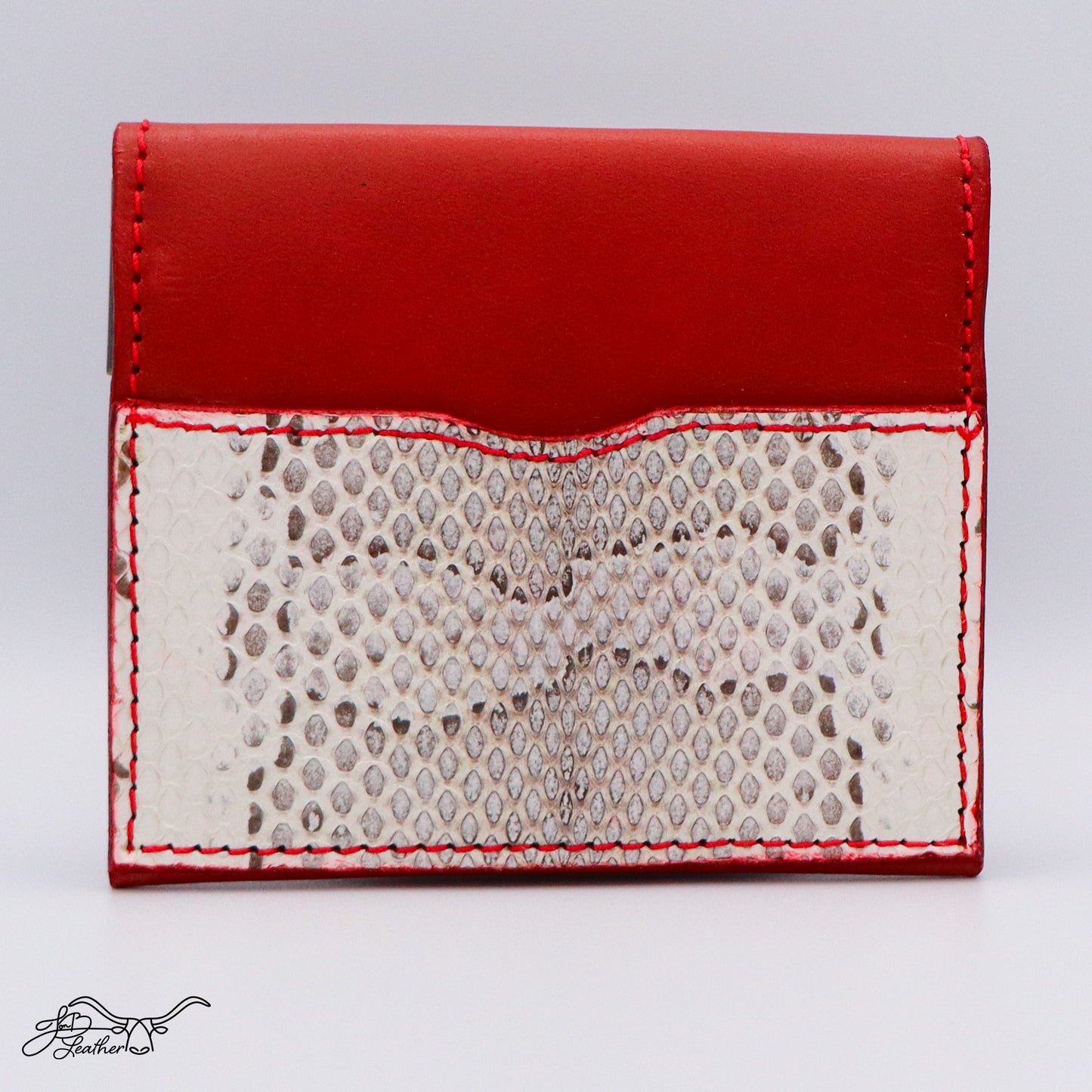 Full grain leather wallet with close-up of real snake skin detail