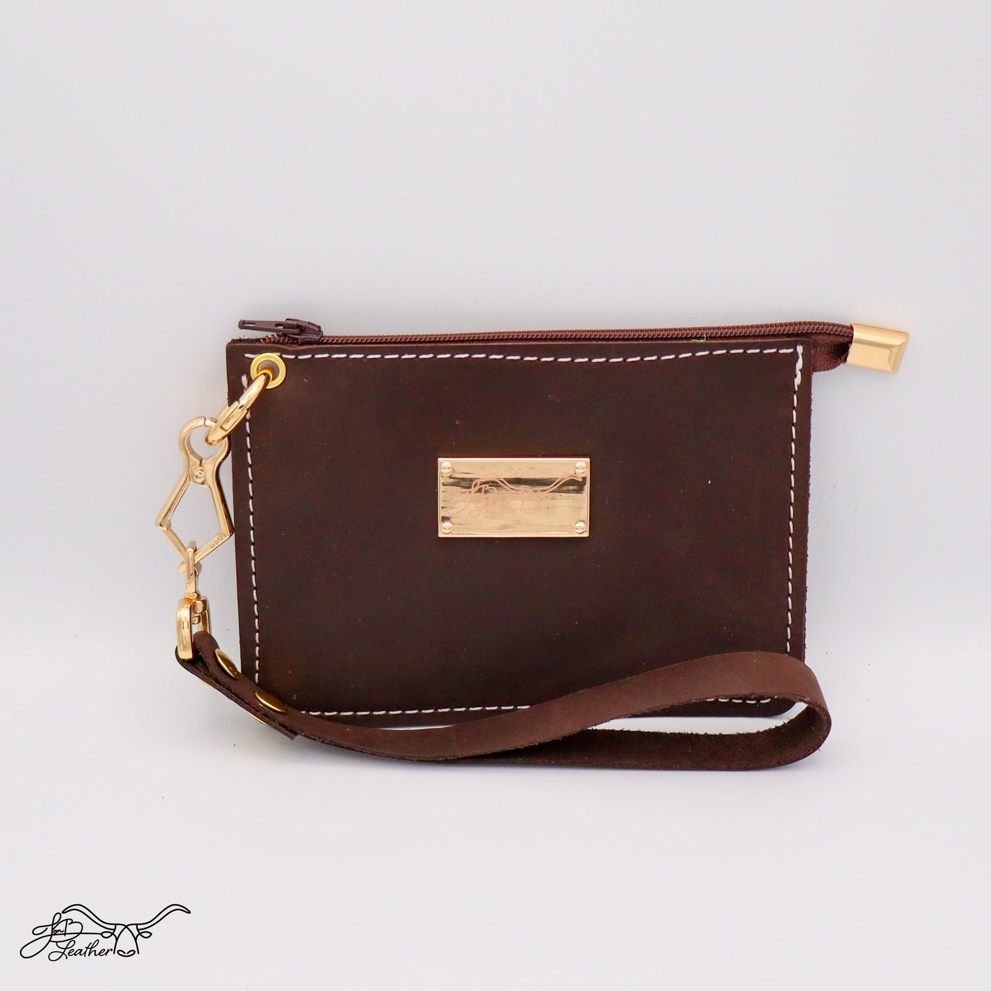 Front view of full grain leather wristlet zipper wallet in brown distressed finish