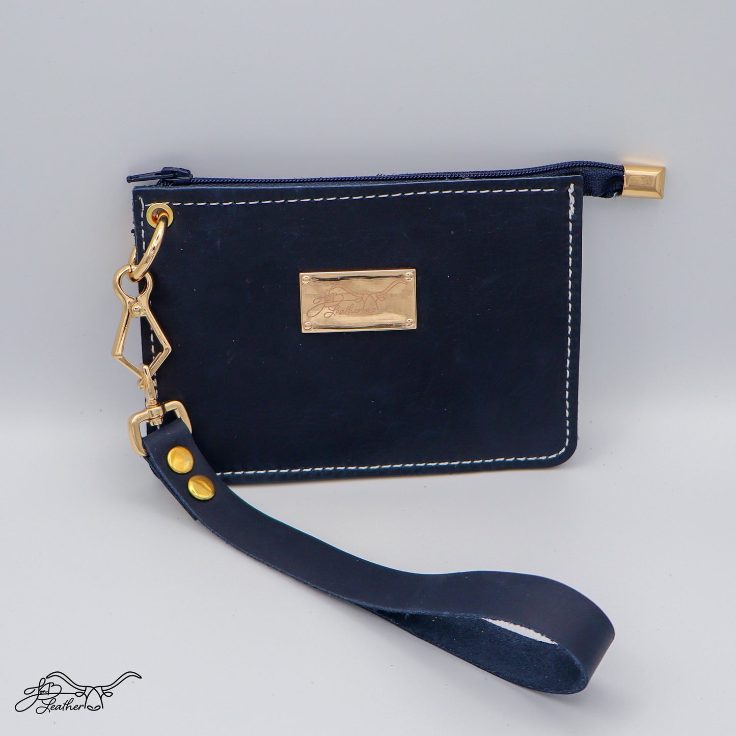 Front view of full grain leather wristlet zipper wallet in navy distressed finish
