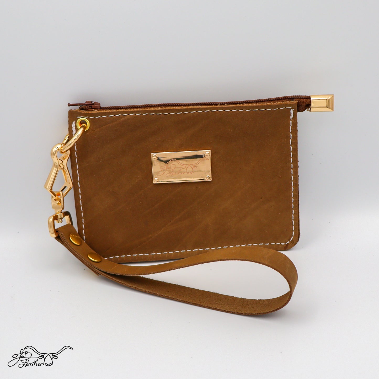 Front view of full grain leather wristlet zipper wallet in tan distressed finish