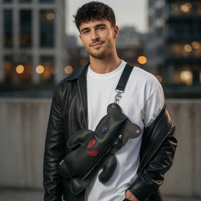 Broken Heart Bear Crossbody worn across the chest with a black strap