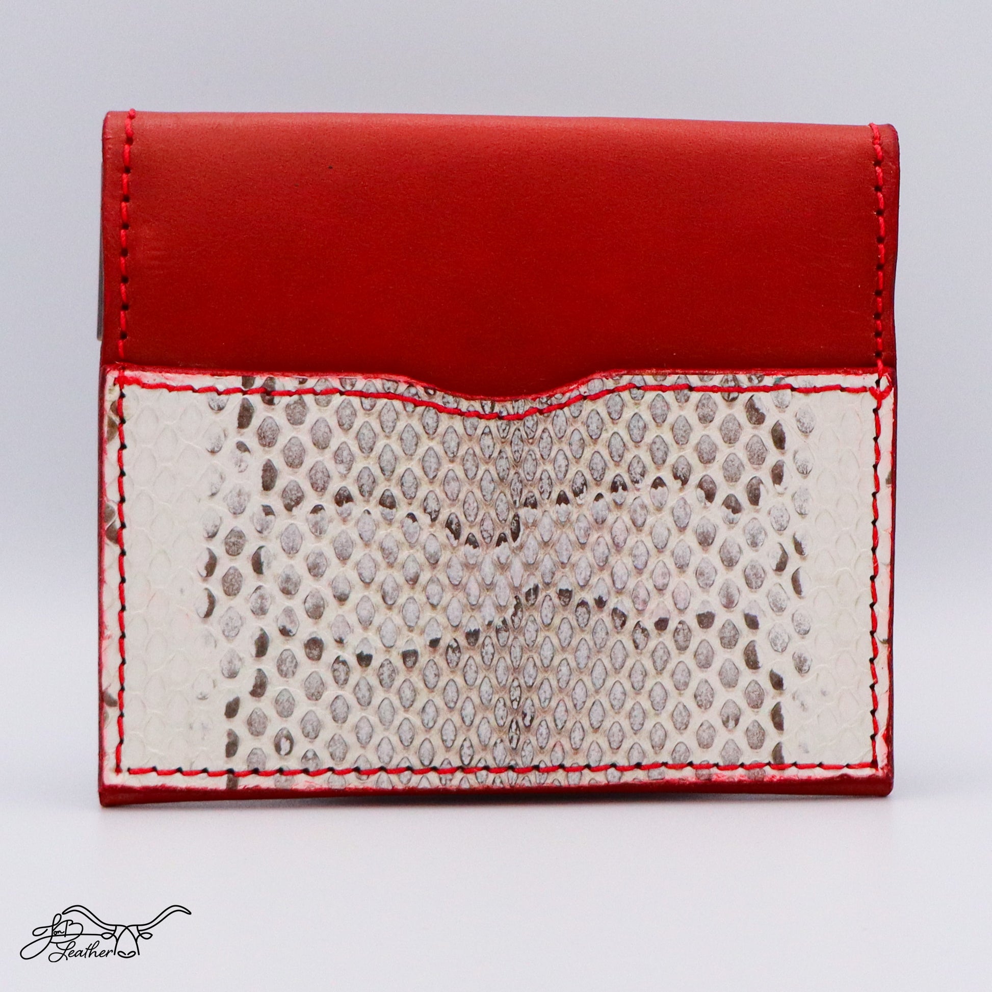 Full grain leather wallet with close-up of real snake skin detail