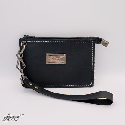 Close-up of leather wristlet wallet strap and stitching black
