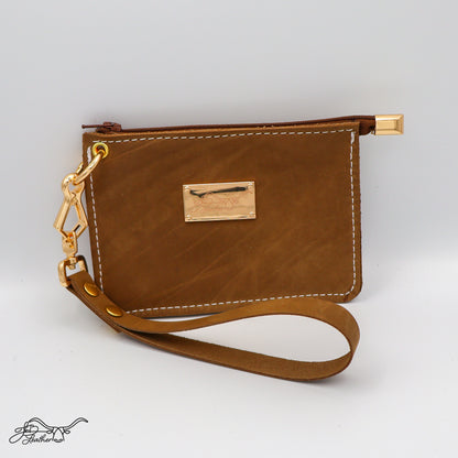Front view of full grain leather wristlet zipper wallet in tan distressed finish